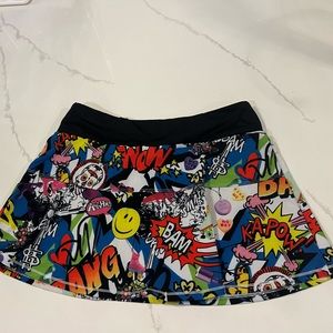 Queen of The Court Kapow tennis skirt.